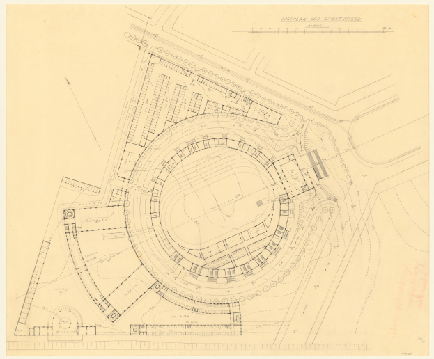 Schwarze und weiße architektonische Zeichnung eines Stadiongrundrisses mit umgebenen Gebäuden und handgeschriebenen Textanmerkungen.