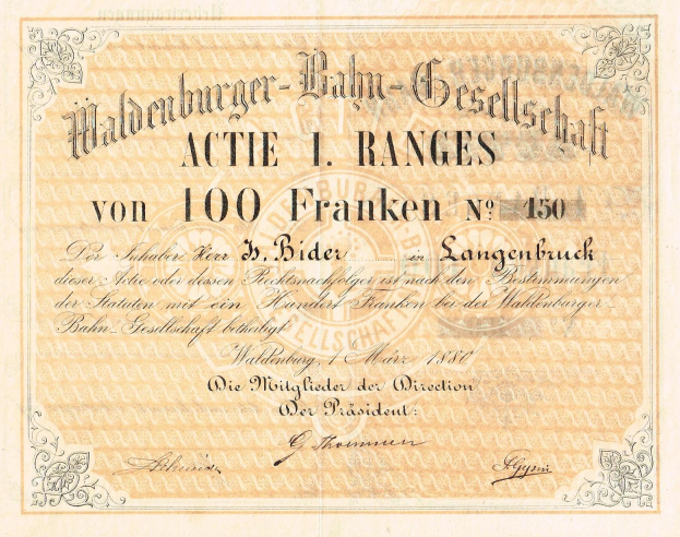 Ein altes deutsches Geldstück mit dem Porträt eines Mannes, darauf der Text "Haldenburger-Balm Gesellschaft Aktie 1 Ranges".