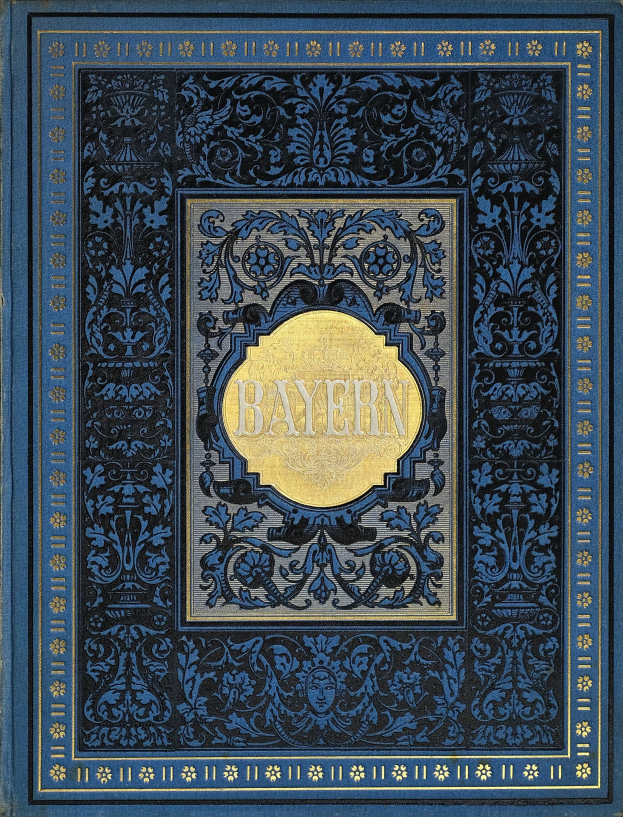 Ein blau-goldenes Buch mit der Aufschrift "Bayern", das mit detaillierten Designs verziert ist.