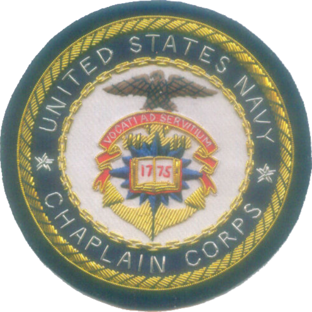 Ein rundes Patch mit einem blauen Hintergrund und einem weißen Rand, auf dem der weiße Text 'United States Navy Chaplain Corps' in der Mitte steht.