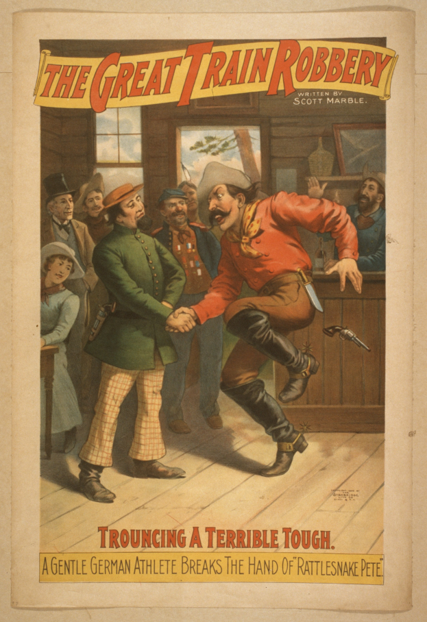 Ein Plakat, das eine Gruppe von Menschen auf einem Boden zeigt, einer hält eine Waffe, mit Text oben und unten: "Der große Zugraub - Trouching ein Schreckliches Tough".